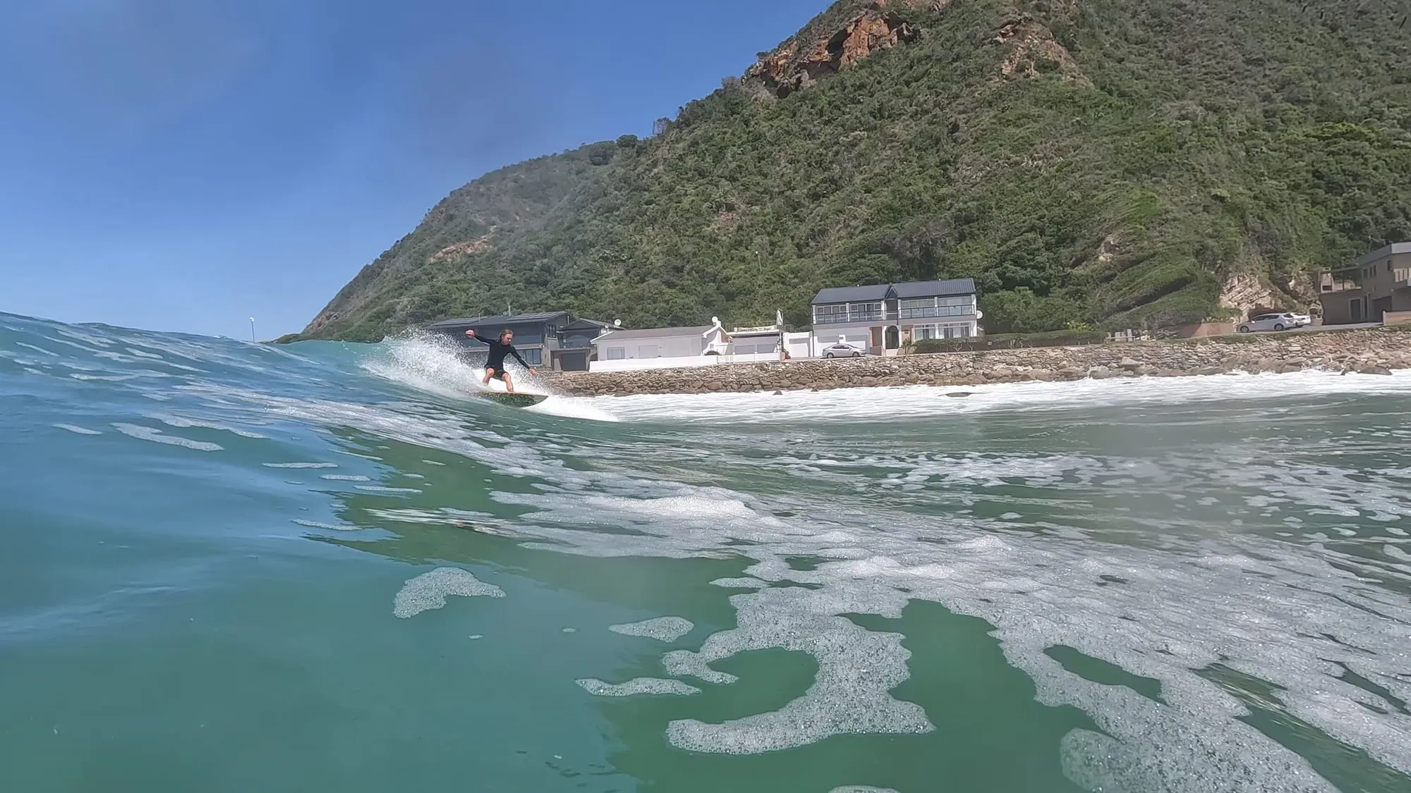 Surfing at Victoria Bay