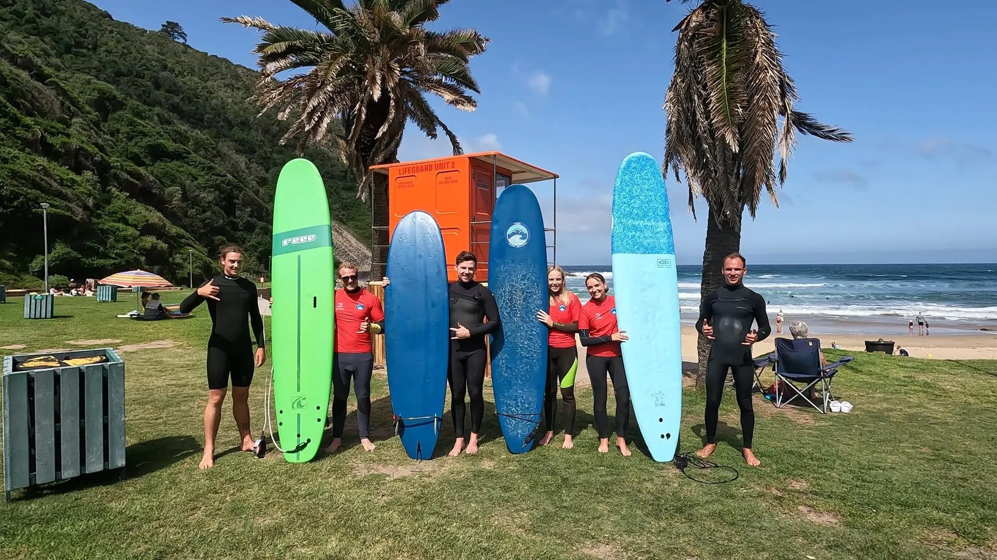 The crew with a quiver of boards